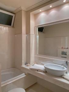 Et badeværelse på Pendeli's Luxury