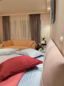 Posteľ alebo postele v izbe v ubytovaní Pendeli's Luxury