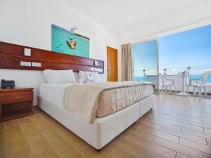 Voodi või voodid majutusasutuse Avlida Hotel toas