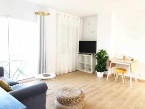 A television and/or entertainment centre at Apartamento 3º Playa Puerto de Pollensa