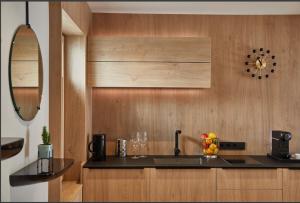 a kitchen with a sink and a counter top at Kaiser 4 in Norderney