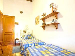 En eller flere senge i et værelse på Welcoming house with pool in San Cristóbal, 70 m²