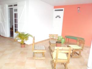 Posezení v ubytování Maison charmante au Diamant - Vue jardin - Climatisée