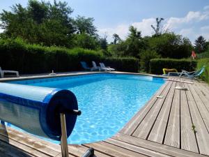 Πισίνα στο ή κοντά στο Appartement chaleureux à Blaignac avec piscine partagée - 55 m²