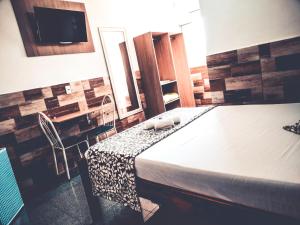 Кровать или кровати в номере Maranim Plaza Hotel
