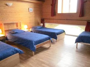 Giường trong phòng chung tại Appartement de 3 chambres avec piscine partagee jardin amenage et wifi a Blaignac