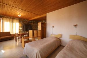 Letto o letti in una camera di Apaga Resort