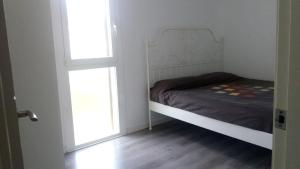 Postel nebo postele na pokoji v ubytování Comfortable Apartment in Roda de Berà - 58 m² - Garden