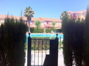 伊斯蘭蒂拉的住宿－2 bedrooms appartement at Islantilla 700 m away from the beach with shared pool and furnished terrace，相簿中的一張相片