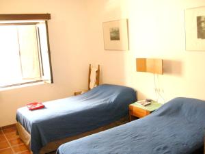 Postel nebo postele na pokoji v ubytování Welcoming House in Albufeira