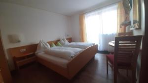 Postel nebo postele na pokoji v ubytování Landhaus Sonnrain