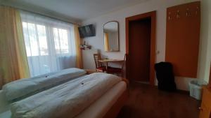 Postel nebo postele na pokoji v ubytování Landhaus Sonnrain