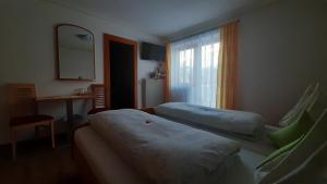 Postel nebo postele na pokoji v ubytování Landhaus Sonnrain