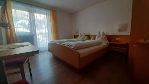 Postel nebo postele na pokoji v ubytování Landhaus Sonnrain