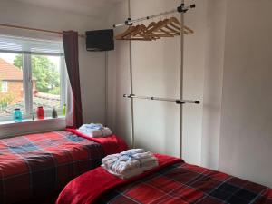 Postel nebo postele na pokoji v ubytování Remarkable 3-Bed House in Durham