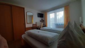 Postel nebo postele na pokoji v ubytování Landhaus Sonnrain