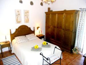 Giường trong phòng chung tại Elegant Apartment in San Cristóbal de La Laguna with Pool – 35 m² +16 ảnh