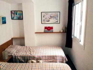 Posteľ alebo postele v izbe v ubytovaní Cozy Apartment in Palamós 65m² + Sea View