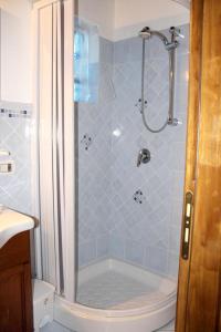 a bathroom with a shower with a toilet and a sink at One bedroom appartement with wifi at Cinisi in Cinisi