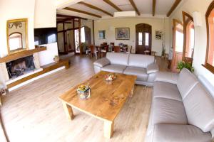a living room with a couch and a coffee table at Exquisite Retreat in Segni in Colleferro