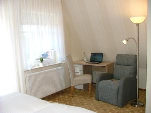 TV a/nebo společenská místnost v ubytování Hotel Thule + 36 fotografií