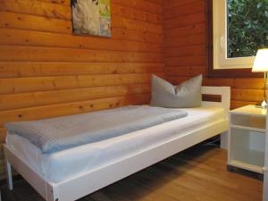Un pat sau paturi într-o cameră la Lärchenallee 77
