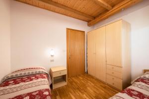 Posteľ alebo postele v izbe v ubytovaní Villa Mazzel with balcony