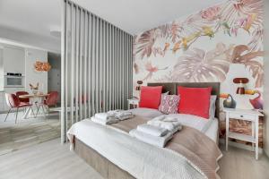 Posteľ alebo postele v izbe v ubytovaní Monte Carlo Luxury Suites with Parking by Lion Apartments Sopot