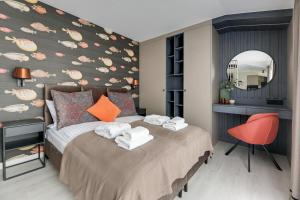 Posteľ alebo postele v izbe v ubytovaní Monte Carlo Luxury Suites with Parking by Lion Apartments Sopot