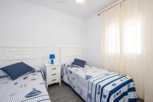 Ένα ή περισσότερα κρεβάτια σε δωμάτιο στο Casa El Palmar 1 +22 φωτογραφίες