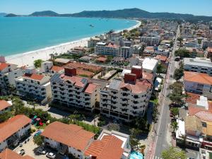 an aerial view of a city and the beach at Paraíso Palace Hotel II e III in Florianópolis