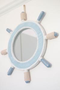 a wooden toy steering wheel with rope at Avocet House in Wells next the Sea