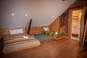 מיטה או מיטות בחדר ב-Ezera Maja