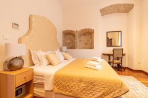 Posteľ alebo postele v izbe v ubytovaní B&B Heritage Villa Apolon