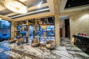 Χώρος καθιστικού στο Hotel NEW YORK Tashkent