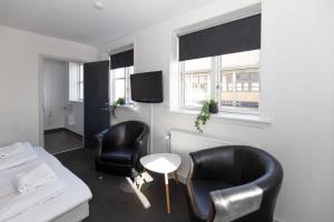 Postel nebo postele na pokoji v ubytování Skagen Hotel Annex