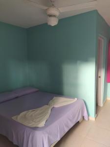 Postel nebo postele na pokoji v ubytování Central Rooms Bayahibe