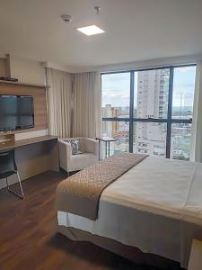 Hotel 7 Itajaí房間的床