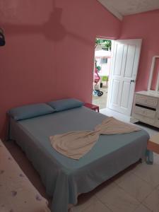Postel nebo postele na pokoji v ubytování Central Rooms Bayahibe