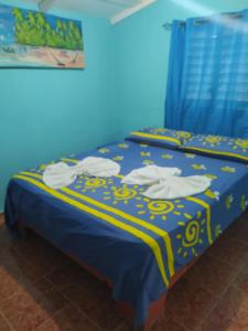 Katil atau katil-katil dalam bilik di Hotel Tipico Maura