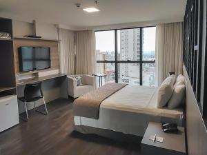 Hotel 7 Itajaí房間的床