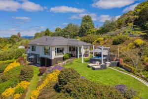 an aerial view of a house with a garden at Bayview Valley Lodge Bed & Breakfast in Whitianga