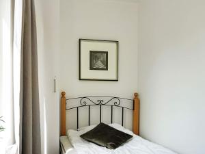 Ένα ή περισσότερα κρεβάτια σε δωμάτιο στο 5 person holiday home in STRÖMSTAD