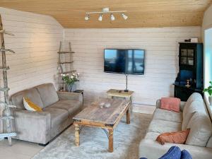 Holiday home TØRRVIKBYGD tesisinde bir oturma alanı