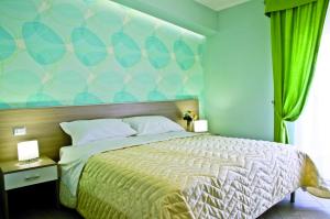 Postel nebo postele na pokoji v ubytování B&B Albachiara