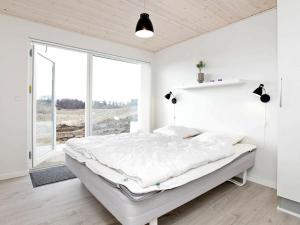 En eller flere senge i et værelse på Four-Bedroom Holiday home in Aabenraa 4