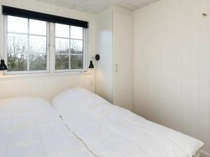 Postel nebo postele na pokoji v ubytování 26 person holiday home in Fr rup