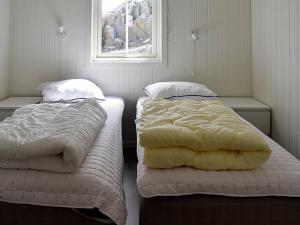 Lova arba lovos apgyvendinimo įstaigoje Holiday home Urangsvåg II