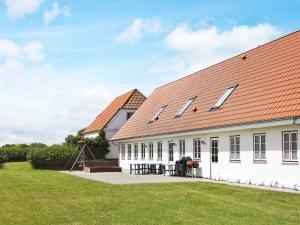 a large white building with a red roof at 20 person holiday home in Nordborg-By Traum in Nordborg