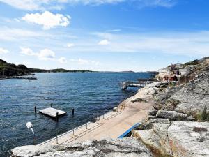 a large body of water with a dock at 4 person holiday home in ELL S in Ellös